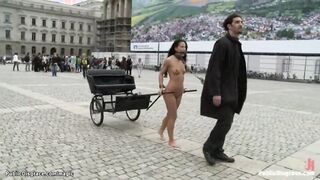 Naked babe pulling charios in public