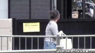 Japanese with big boobs peeing on parking & later in