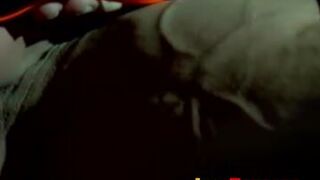 Muscle jock tied up with thick rope during outdoor BDSM