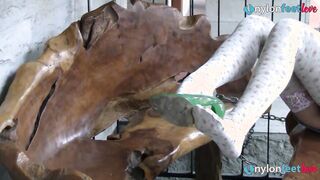 Hot blonde shows off her cute feet wearing stockings