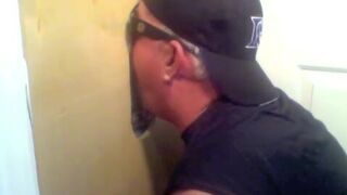 Two sexy visitors take turns for a sexy glory hole blowjob