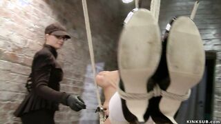 Hogtied lesbian gets tormented