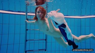 Teen chick Avenna is swimming in the pool