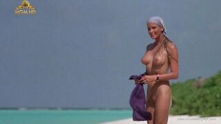 Mesmerizing Bo Derek showing off her bushy twat at the beach