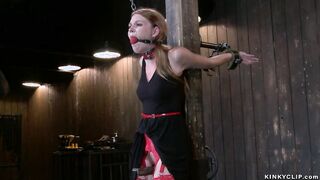 Gagged slave in red stockings whipped