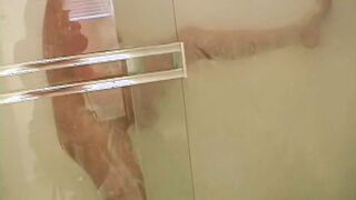 Pretty blonde teen showering