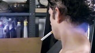Attractive Ian Madrox is blowing smoke & starts stretching his dick in his smo