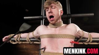 Kyler Drake makes Jesse Stone bite a gag as he drips sexy wax over him