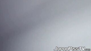 Delectable Japanese babe is peeing outside during day time