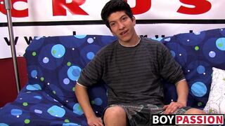 Interviewed young twink jerks off his big cock & cums